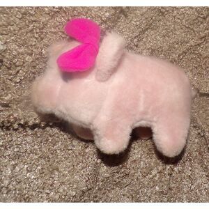 walking oinking pink fuzzy pig
